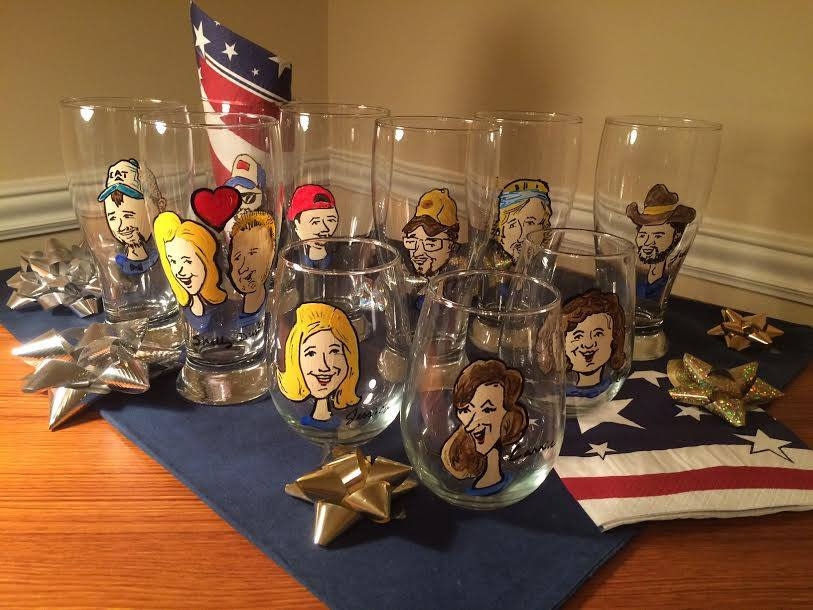 caricatures on wine glasses